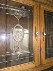 Solid Oak China Cabinet with Beveled Glass and Bronze Hardware. whit lights