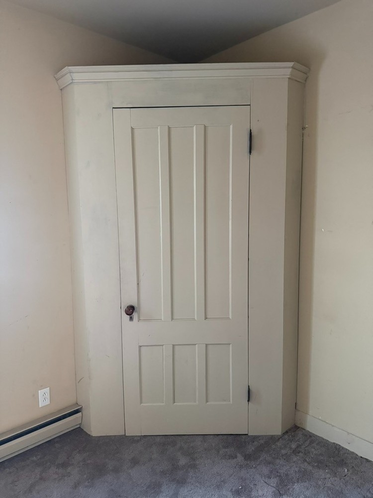 Antique Corner Closet – Painted White with antique porcelain doorknob