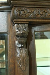 F32950EC: Antique Victorian Oak Lion Carved Bow Front China Cabinet