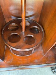 R.J. HORNER CARVED GRIFFIN LIQUOR BAR CABINET