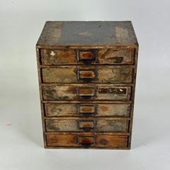 Antique Six Drawers Desktop Office Cabinet With Remnant Embossed Paper Over Wood