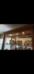 Howard Miller Parkview Curio Cabinet (Cherry Bordeaux Finish)