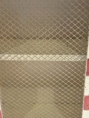 Cottage Core Painted Checkerboard Wall Cabinet with Rustic Wire Mesh Door