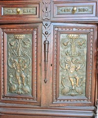 VICTORIAN OAK CABINET W FIGURAL BRASS PANELS