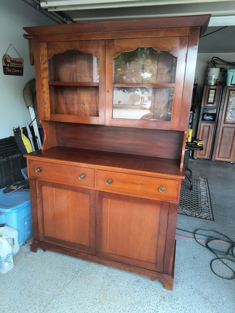 vintage hutch cabinet and buffet. Includes 6 chairs and oval kitchen table.