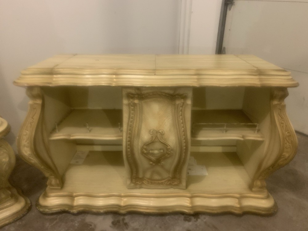 Antique baroque-style cream and gold wooden home bar cabinet.