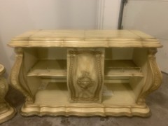 Antique baroque-style cream and gold wooden home bar cabinet.