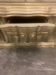 Antique baroque-style cream and gold wooden home bar cabinet.
