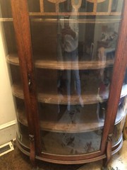 Antique China Cabinet with curved glass and clawed feet !