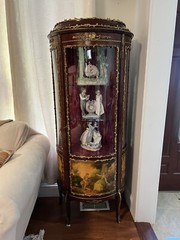 antique curved glass curio cabinet