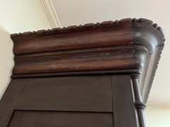 antique display cabinet with beveled glass door