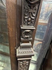 A. J. JOHNSON CARVED OAK CHINA CABINET