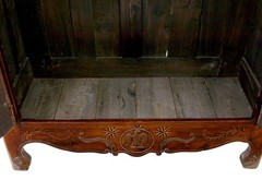 18TH CENTURY CARVED FRENCH YEW AND CHESTNUT ARMOIRE