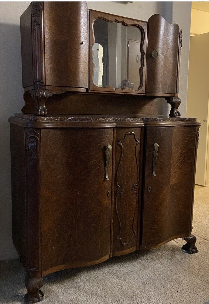 antique hutch cabinet – marble top, beveled glass doors and beveled mirror.