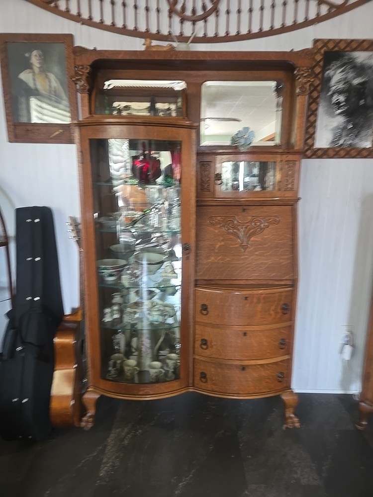 vintage antique curved glass curio cabinet circa 1930s in excellent condition.