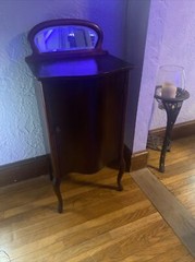 Antique mahogany music cabinet