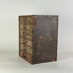 Antique Six Drawers Desktop Office Cabinet With Remnant Embossed Paper Over Wood