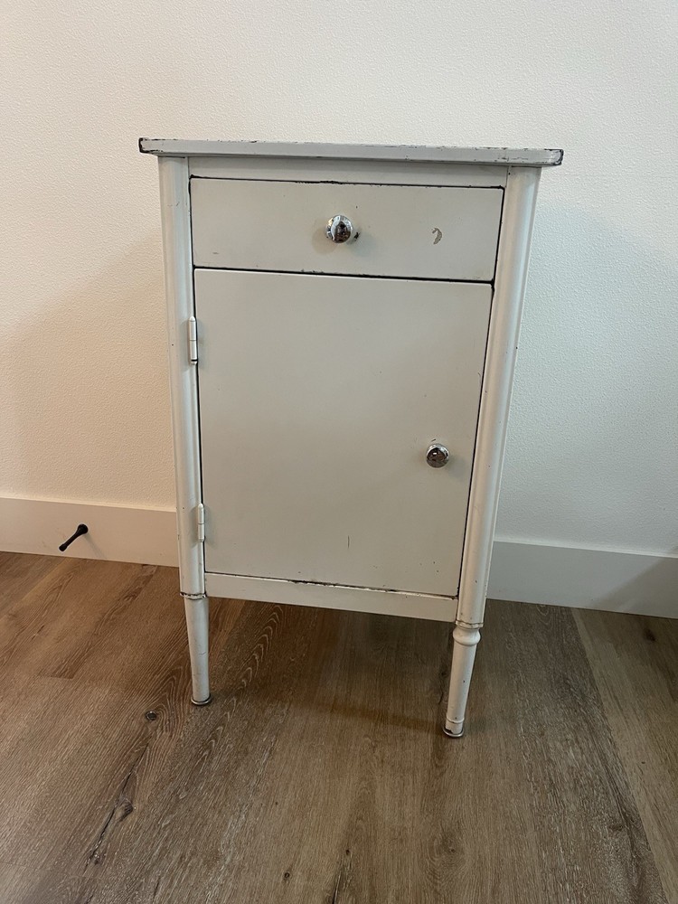 Antique White Metal Cabinet with Drawer, Shelves, and Cupboard Door