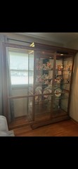 Howard Miller Parkview Curio Cabinet (Cherry Bordeaux Finish)