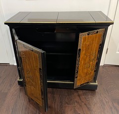 Drexler 1970’s chinoisserie style bar/cabinet on wherls.
