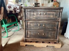Rustic three-drawer nightstand blends seamlessly into a western-styled home.