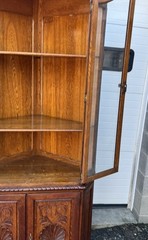 PAIR OF VICTORIAN OAK CHIPPENDALE BEVELED GLASS CORNER CHINA CABINETS
