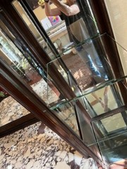 antique hutch cabinet – marble top, beveled glass doors and beveled mirror.
