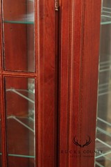 Pulaski Traditional Lighted Cherry Corner Curio Cabinet With Arched Pediment