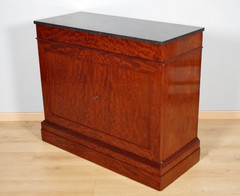 Empire-style chest of drawers with doors in moiré mahogany, circa 1810