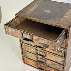 Antique Six Drawers Desktop Office Cabinet With Remnant Embossed Paper Over Wood