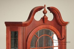 Pulaski Traditional Lighted Cherry Corner Curio Cabinet With Arched Pediment