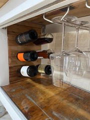 Reclaimed vintage wood bar cart/ island with cooler and wine rack. 