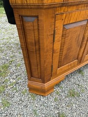 DR Dimes corner cupboard in strong tiger maple for Colonial Williamsburg.