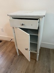 Antique White Metal Cabinet with Drawer, Shelves, and Cupboard Door
