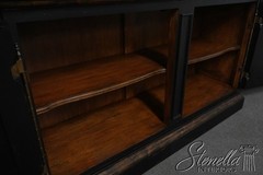 69061: MARGE CARSON Monumental Black Painted Finish China Cabinet