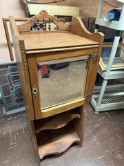 Antique Wooden Cabinet with Beveled Mirror Compartment and Lower Shelves Vintage