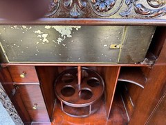 R.J. HORNER CARVED GRIFFIN LIQUOR BAR CABINET