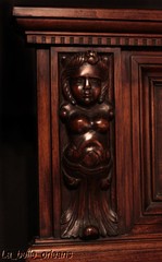 SUPERB WALNUT CARVED FIGURAL CABINET WITH HUTCH. WOW!!!