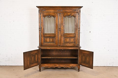 Baker Furniture French Provincial Louis XV Carved Oak Lighted Bar Cabinet, 1960s
