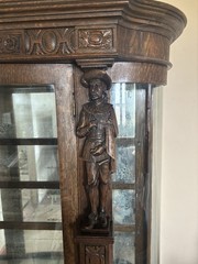 Unique and Unusual Curved Glass China Cupboard with Carved Figures C.1900