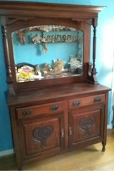 Vintage Mahogany Carved Front Mirrored Stepback Cabinet.