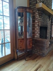 vintage antique curved glass curio cabinet circa 1930s in excellent condition.