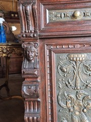 VICTORIAN OAK CABINET W FIGURAL BRASS PANELS