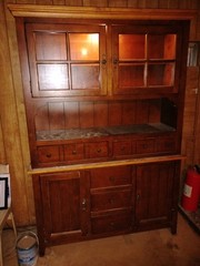 It’s A Two Piece Hutch Cabinet with Two Doors