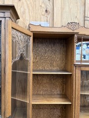 Antique Oak Display Cabinet with Carved Details and Curved Glass