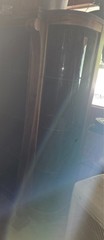 Beautiful oak antique china cabinet with beveled side glasses original finish.