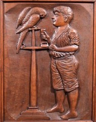 Antique French Cabinet Highly Carved Chestnut Wood w/Boy Girl and Bird (Macaw)
