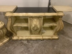Antique baroque-style cream and gold wooden home bar cabinet.