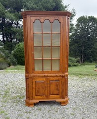 DR Dimes corner cupboard in strong tiger maple for Colonial Williamsburg.