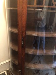 Antique China Cabinet with curved glass and clawed feet !